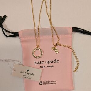 kate spade gold-tone crystal circle pendant necklace with pink pouch